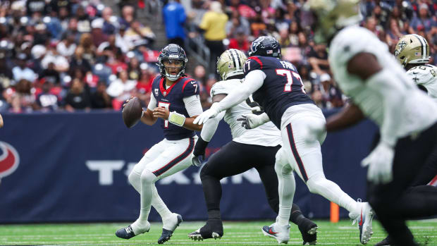 Houston Texans quarterback C.J. Stroud (7) looks for an open receiver during the second quarter against the New Orleans Saints at NRG Stadium.